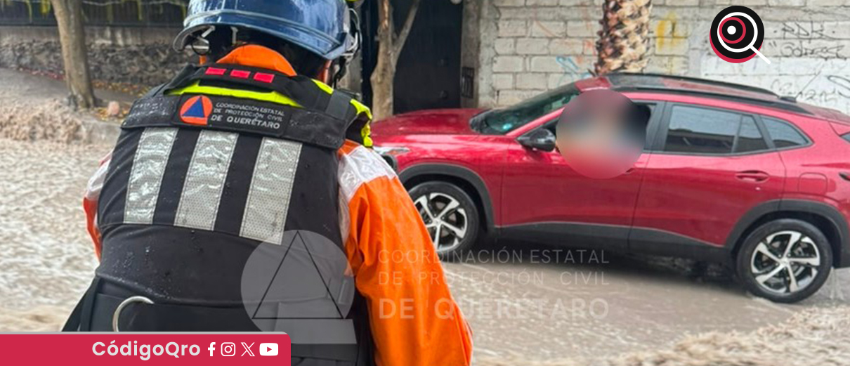 La lluvia de este jueves dejó atrapados a un menor y una mujer en Menchaca
